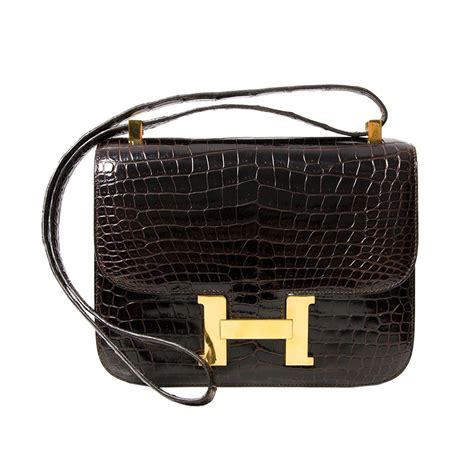 hermes croc constance mini wallet|hermes constance wallet price.